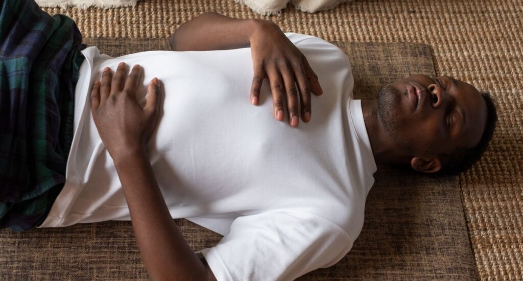 Man doing breathwork to support hormonal health